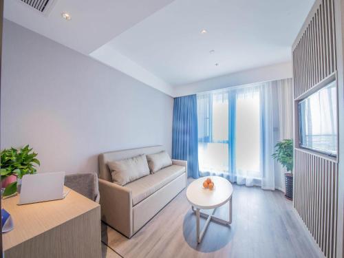 Imagen de la habitación del Hotel Kyriad Marvelous Qinhuangdao Nandaihe. Foto 20