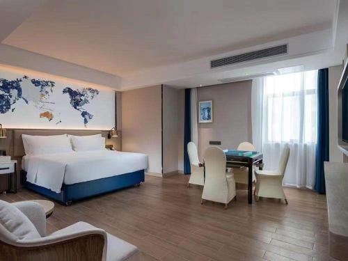 Imagen de la habitación del Hotel Kyriad Marvelous Shenzhen Longgang Dayun City Center. Foto 16