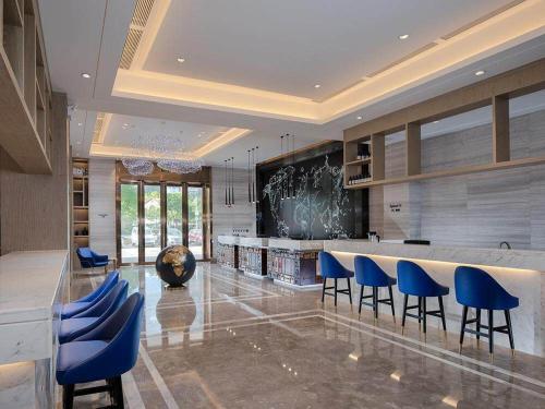 Imagen general del Hotel Kyriad Marvelous Shenzhen Longgang Dayun City Center. Foto 4