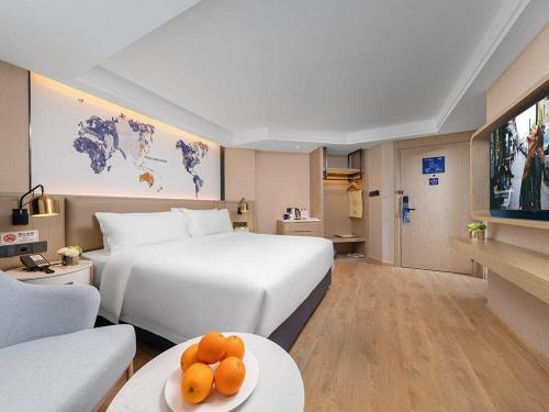 Imagen de la habitación del Hotel Kyriad Marvelous Shenzhen Nanlian Metro Station. Foto 19