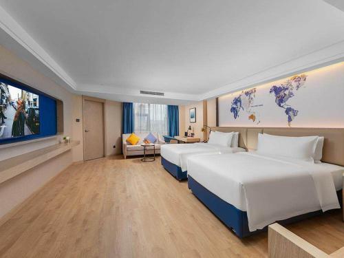 Imagen de la habitación del Hotel Kyriad Marvelous Shenzhen Nanlian Metro Station. Foto 20