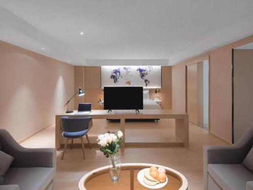 Imagen de la habitación del Hotel Kyriad Marvelous Suzhou Wujiang People Square. Foto 15