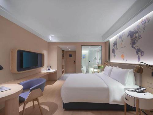Imagen de la habitación del Hotel Kyriad Marvelous Suzhou Wujiang People Square. Foto 16