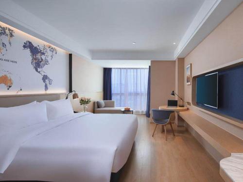 Imagen general del Hotel Kyriad Marvelous Suzhou Wujiang People Square. Foto 2