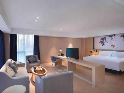 Imagen general del Hotel Kyriad Marvelous Suzhou Wujiang People Square. Foto 3