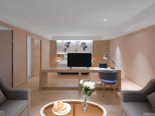 Imagen de la habitación del Hotel Kyriad Marvelous Suzhou Wujiang People Square. Foto 18