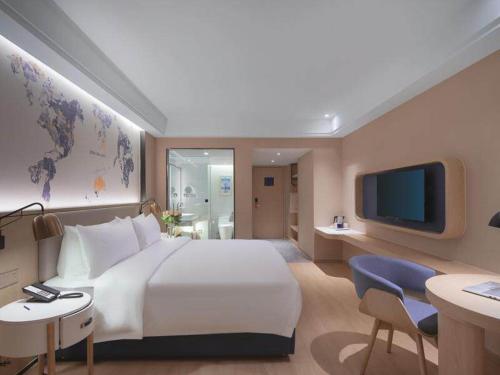 Imagen de la habitación del Hotel Kyriad Marvelous Suzhou Wujiang People Square. Foto 20