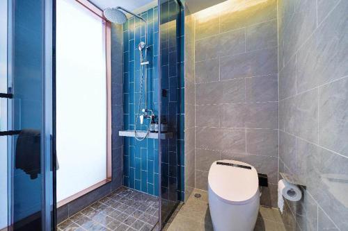 Imagen general del Hotel Kyriad Marvelous Weihai Happy Gate Weigao Plaza. Foto 10