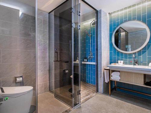 Imagen de la habitación del Hotel Kyriad Marvelous Weihai Happy Gate Weigao Plaza. Foto 17