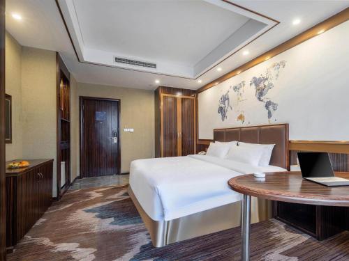 Imagen general del Hotel Kyriad Marvelous Weihai Railway Station. Foto 4