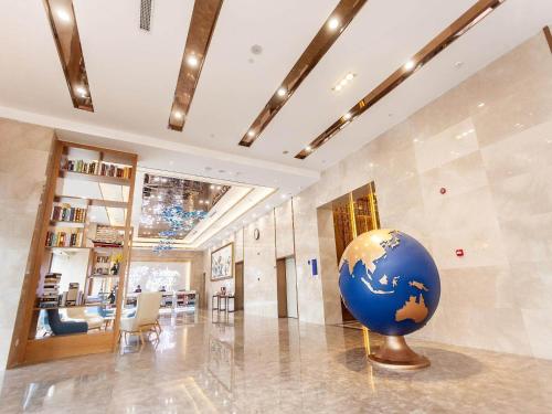 Imagen general del Hotel Kyriad Marvelous Weihai Railway Station. Foto 6
