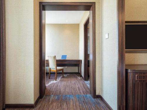 Imagen general del Hotel Kyriad Marvelous Weihai Railway Station. Foto 8