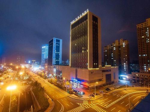 Imagen general del Hotel Kyriad Marvelous Weihai Railway Station. Foto 10