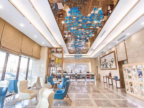 Imagen general del Hotel Kyriad Marvelous Weihai Railway Station. Foto 12