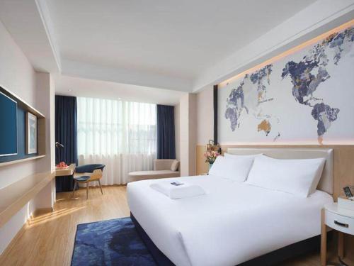 Imagen de la habitación del Hotel Kyriad Marvelous Yiyang Ziyang. Foto 14