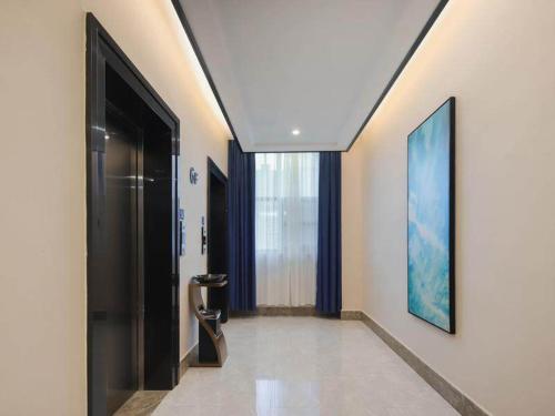 Imagen general del Hotel Kyriad Marvelous Yiyang Ziyang. Foto 13