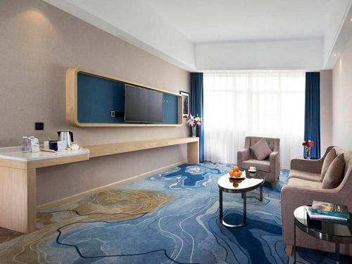 Imagen de la habitación del Hotel Kyriad Marvelous Zhongshan Nanlang Center. Foto 9