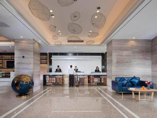 Imagen general del Hotel Kyriad Marvelous Zhongshan Nanlang Center. Foto 6