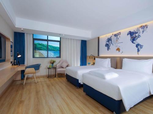 Imagen de la habitación del Hotel Kyriad Marvelous Zhongshan West District. Foto 15