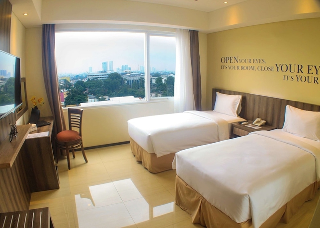 Imagen de la habitación del Hotel Kyriad Metro Cipulir Jakarta. Foto 7