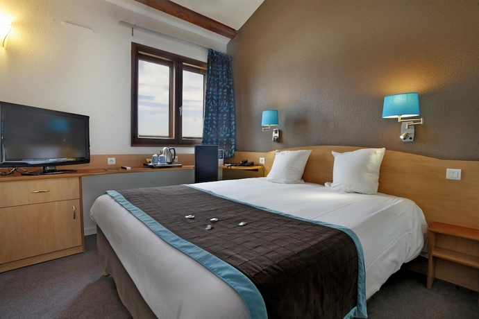 Imagen de la habitación del Hotel Kyriad Montpellier Aéroport - Parc Expo. Foto 1