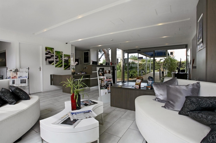 Imagen de los interiores del Hotel Kyriad Montpellier Aeroport Gare Tgv Sud De France. Foto 18