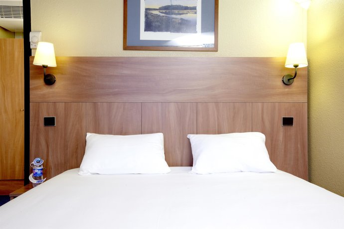 Imagen de la habitación del Hotel Kyriad Mulhouse Est - Lutterbach. Foto 9