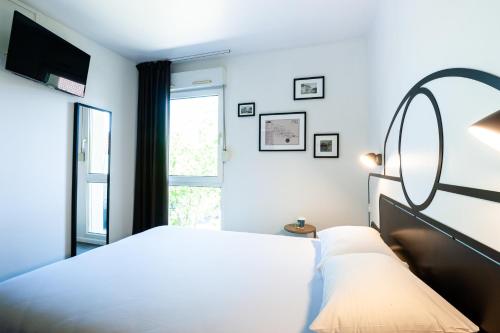 Imagen de la habitación del Hotel Kyriad Nuits Saint Georges Dijon Sud. Foto 17