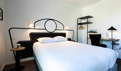 Imagen de la habitación del Hotel Kyriad Nuits Saint Georges Dijon Sud. Foto 18