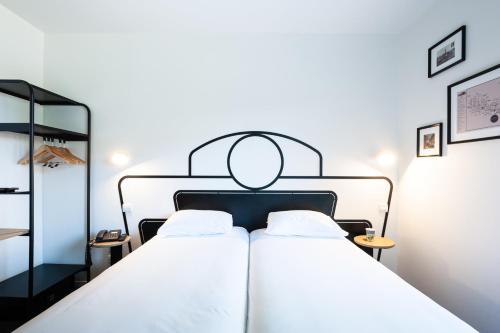Imagen de la habitación del Hotel Kyriad Nuits Saint Georges Dijon Sud. Foto 19