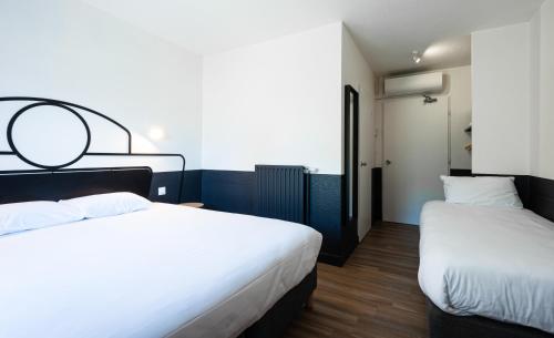 Imagen de la habitación del Hotel Kyriad Nuits Saint Georges Dijon Sud. Foto 20