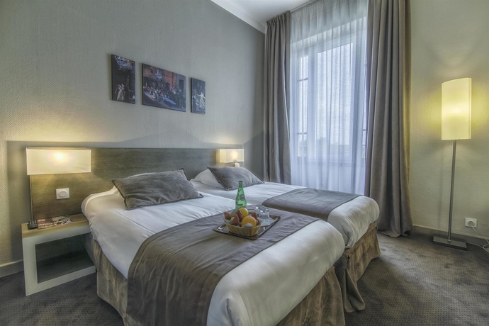 Imagen de la habitación del Hotel Kyriad Orange Centre. Foto 8