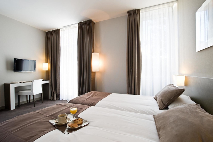 Imagen de la habitación del Hotel Kyriad Orange Centre. Foto 10