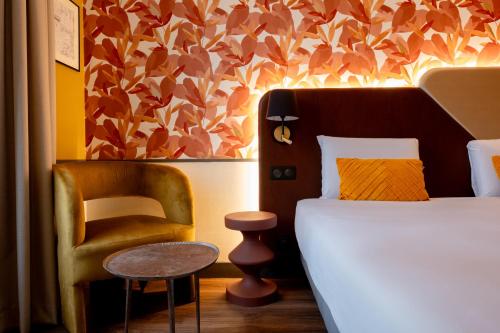 Imagen de la habitación del Hotel Kyriad Paris 10 Canal Saint Martin. Foto 19