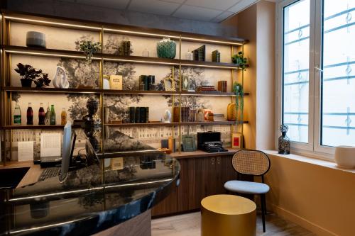 Imagen general del Hotel Kyriad Paris 10 Canal Saint Martin. Foto 7