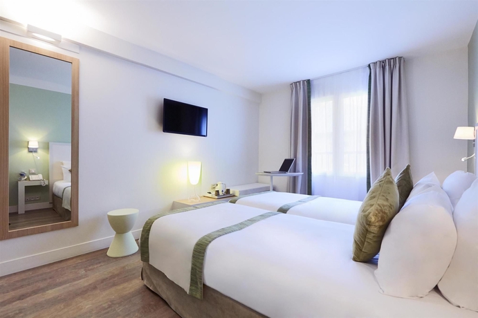 Imagen de la habitación del Hotel Kyriad Paris 18 - Porte de Clignancourt. Foto 2