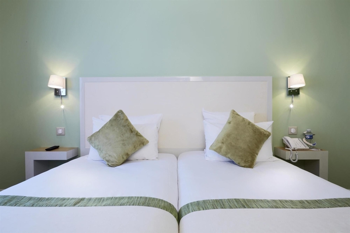 Imagen de la habitación del Hotel Kyriad Paris 18 - Porte de Clignancourt. Foto 12