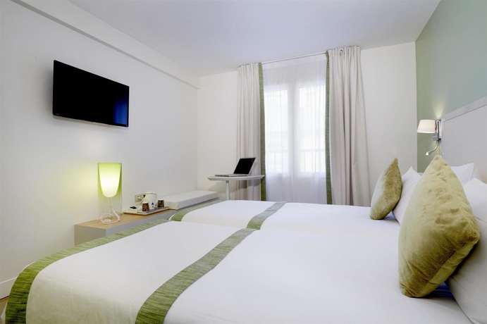 Imagen de la habitación del Hotel Kyriad Paris 18 - Porte de Clignancourt. Foto 13