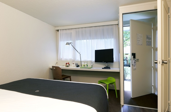 Imagen de la habitación del Hotel Kyriad Paris Nord - Ecouen La Croix Verte. Foto 12