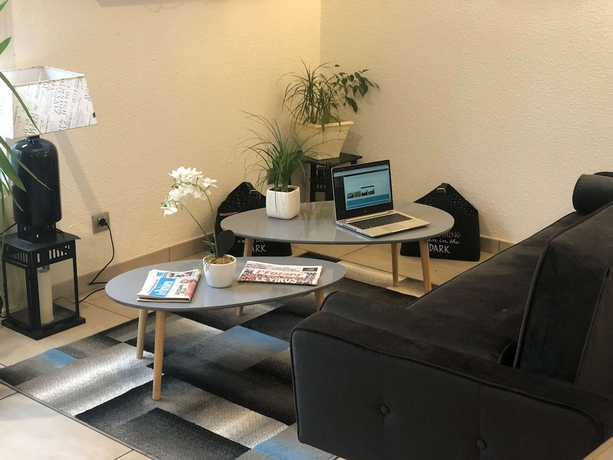 Imagen del bar/restaurante del Hotel Kyriad Paris Nord - Ecouen La Croix Verte. Foto 8