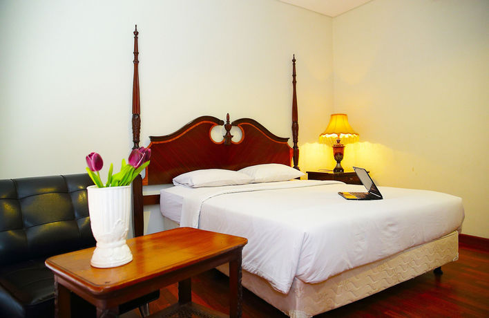 Imagen de la habitación del Hotel Kyriad Pejaten Suites. Foto 4