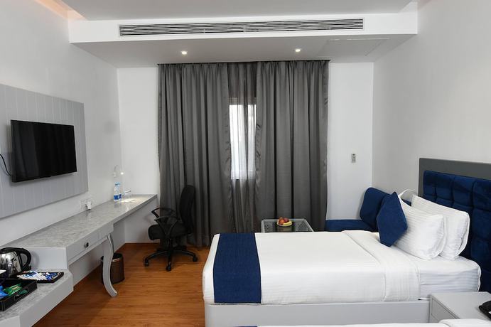 Imagen de la habitación del Hotel Kyriad Pimpri. Foto 11