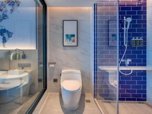 Imagen de la habitación del Hotel Kyriad Pingxiang Wanlong Bay Branch. Foto 16