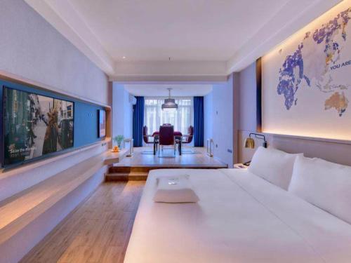 Imagen de la habitación del Hotel Kyriad Pingxiang Wanlong Bay Branch. Foto 19