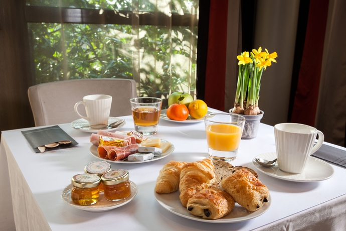 Imagen del bar/restaurante del Hotel Kyriad Prestige Beaune - Le Panorama. Foto 4