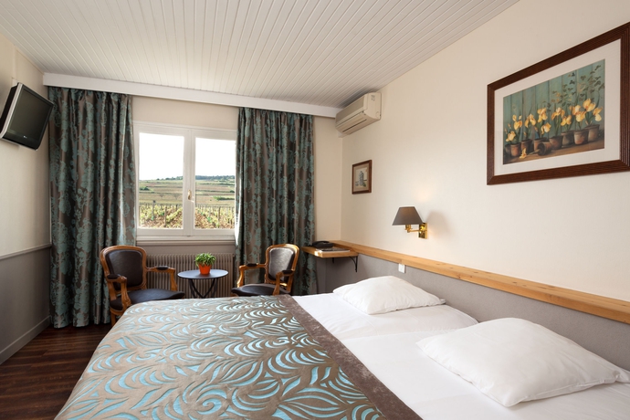 Imagen de la habitación del Hotel Kyriad Prestige Beaune - Le Panorama. Foto 12