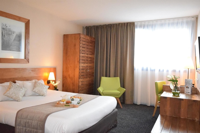 Imagen de la habitación del Hotel Kyriad Prestige Bordeaux Ouest Mérignac. Foto 10