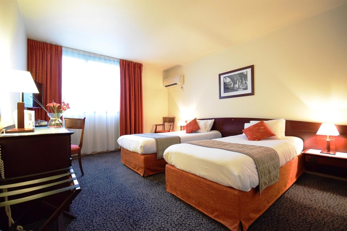 Imagen de la habitación del Hotel Kyriad Prestige Bordeaux Ouest Mérignac. Foto 11