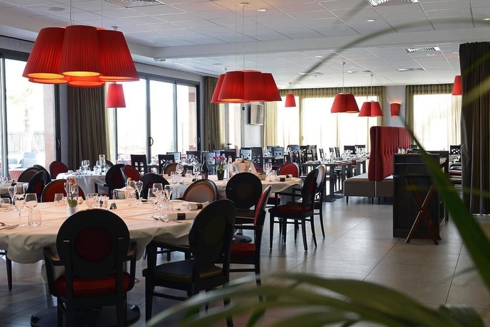 Imagen del bar/restaurante del Hotel Kyriad Prestige Lyon Est - Saint Priest Eurexpo and Spa. Foto 1