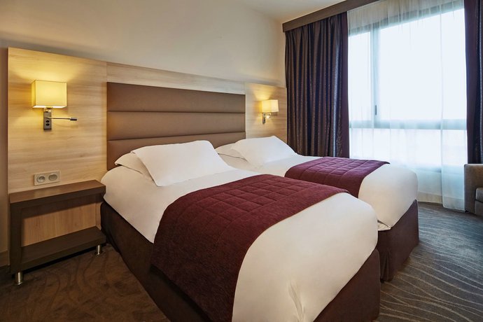 Imagen de la habitación del Hotel Kyriad Prestige Lyon Est - Saint Priest Eurexpo and Spa. Foto 6